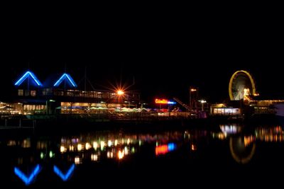 Bridge over river at night