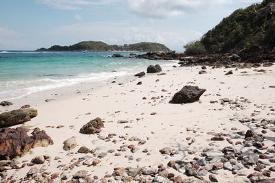 Scenic view of beach against sky