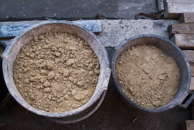 High angle view of soil in containers footpath