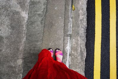 Low section of woman standing outdoors