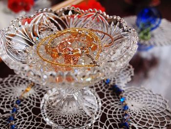 Close-up of decoration on glass table