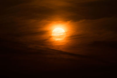 Low angle view of dramatic sky during sunset