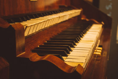 Close-up of piano keys at church