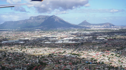 Aerial view of townscape against sky