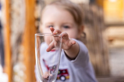 Portrait of a girl drinking from glass