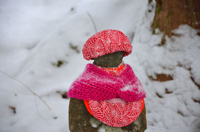 Close-up of person wearing hat