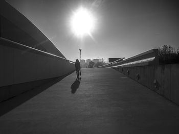 Low angle view of people walking on street