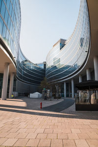 Modern buildings against clear sky