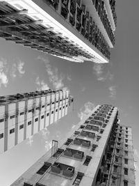 Low angle view of modern buildings against sky