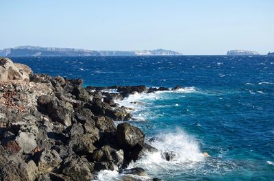 Scenic view of sea against blue sky