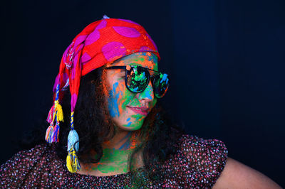 A young girl celebrating the festival of colours, holi.