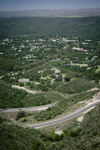 High angle view of winding road in city