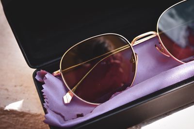 Close-up of sunglasses on table