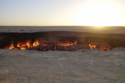 Scenic view of beach against clear sky