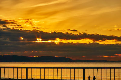 Scenic view of sea against sky during sunrise