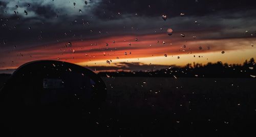 Raindrops on glass window during rainy season