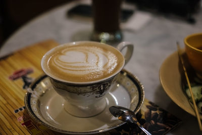 Coffee cup on table