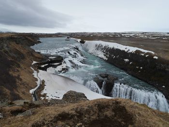 Scenic view of sea against sky during winter