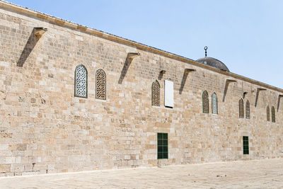 Low angle view of building against clear sky