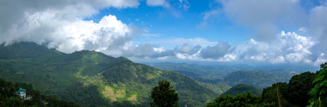 PANORAMIC VIEW OF LANDSCAPE AND MOUNTAINS AGAINST SKY