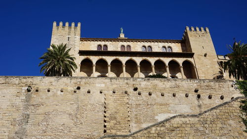 Low angle view of historical building against sky