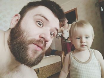 Portrait of cute baby at home