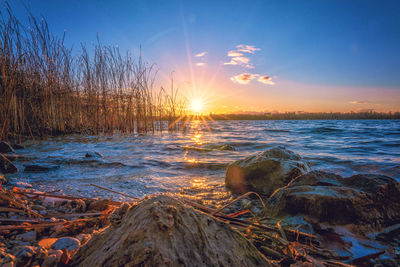 Scenic view of sea against sky during sunset