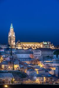 Buildings in city at night