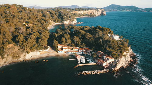 High angle view of townscape by sea