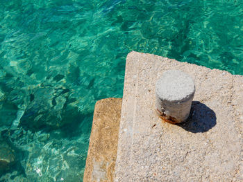 High angle view of rock by swimming pool