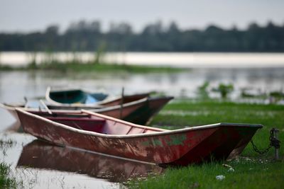 Boat moored at lakeshore