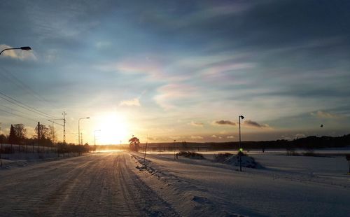 Road against sky during winter