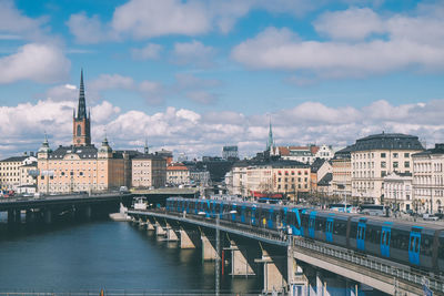 View of bridge over river in city