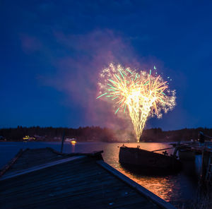 Firework display at night