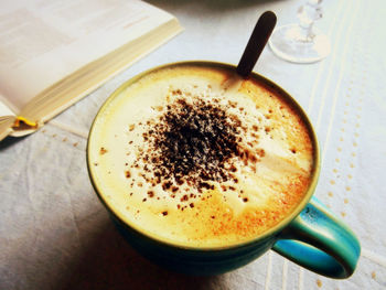 Close-up of cappuccino on table