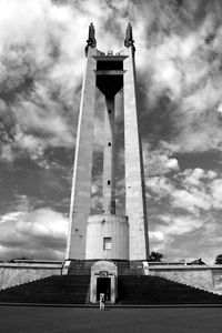 View of tower against cloudy sky