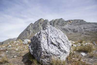 Rock formations on landscape against sky