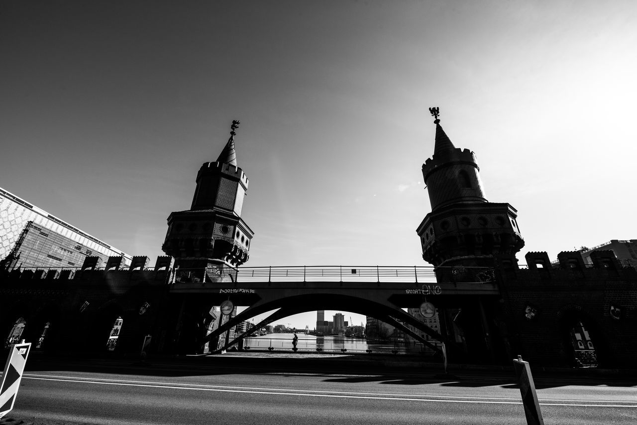 LOW ANGLE VIEW OF BRIDGE AND BUILDINGS AGAINST SKY