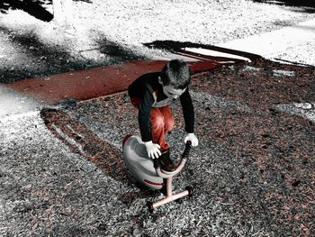 Woman standing on railroad platform