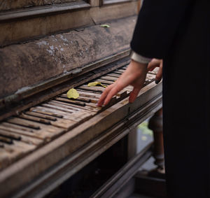 Hands playing piano