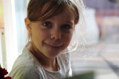 Close-up portrait of smiling girl