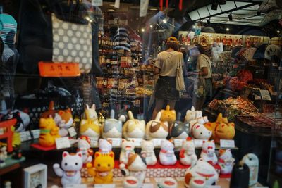 People at market stall