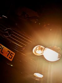 High angle view of illuminated lighting equipment on table