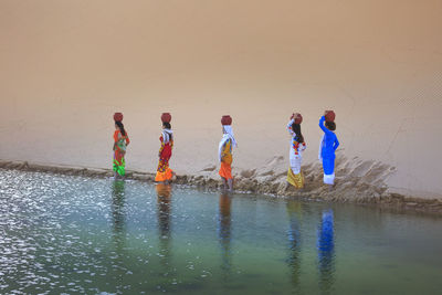 Children playing in lake