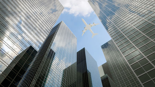 Low angle view of modern buildings against sky