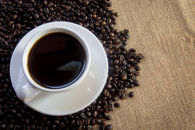 Directly above shot of coffee cup on table