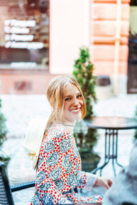 Portrait of a smiling young woman