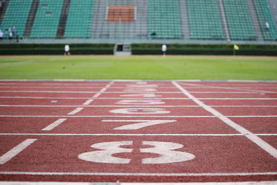Starting line of running track at stadium