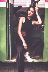 Young woman sitting in bus