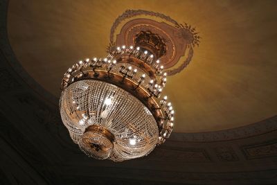 Low angle view of illuminated chandelier